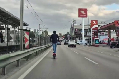 Bursa'da sol şeritte scooter sürücüsünün tehlikeli yolculuğu