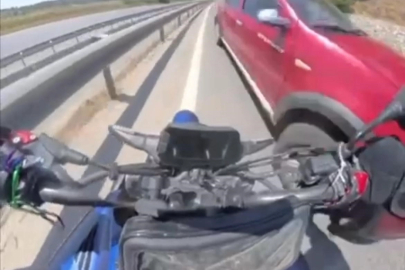 Bursa'da motosikletli sürücü ters yönden gelen otomobille burun buruna geldi
