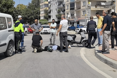 Bursa'da kavşakta meydana gelen kaza yere düşerek yaralandı