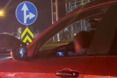 Bursa’da tehlikeli görüntü: Sürücü çocuğunu kucağında taşıdı!