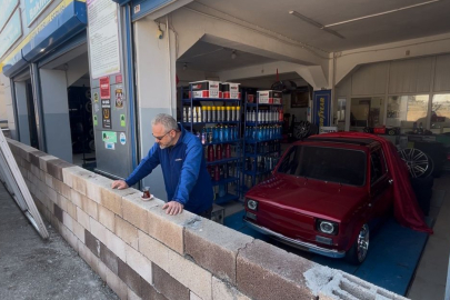 Bursa'da ortaklar anlaşamadı, oto lastikçinin önüne duvar örüldü