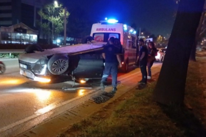 Bursa'da gece saatlerinde korkutan kaza! Takla atan araç ters döndü