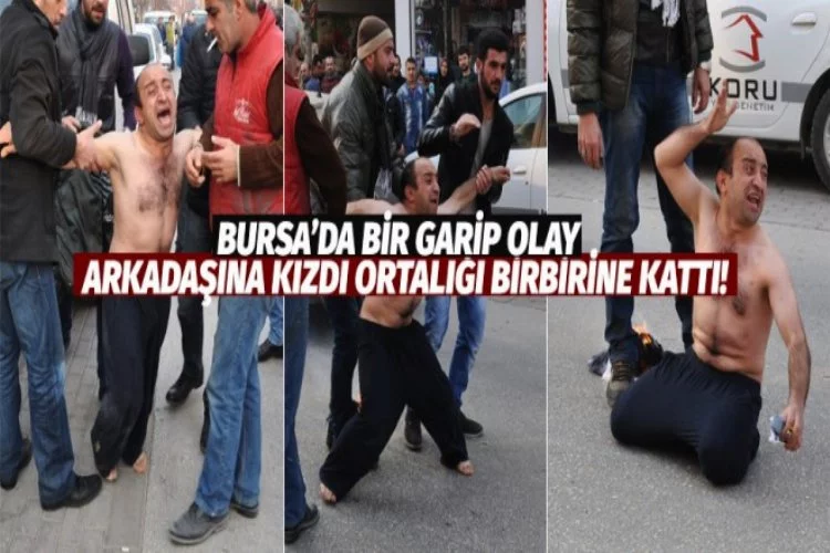Bursa'da cadde ortasında eşyalarını yaktı