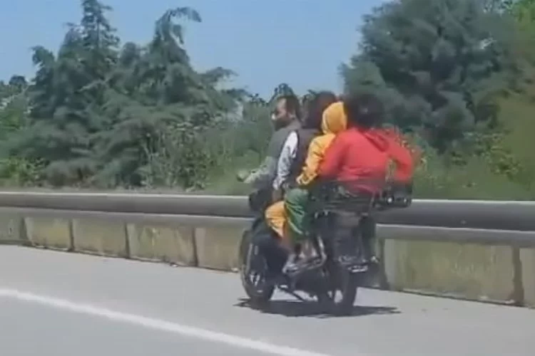Bursa'da canlarını hiçe saydılar! 4 kişi bir motosiklette yolculuk etti