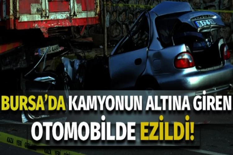 Bursa'da kamyonun altında kalan otomobilde feci şekilde can verdi